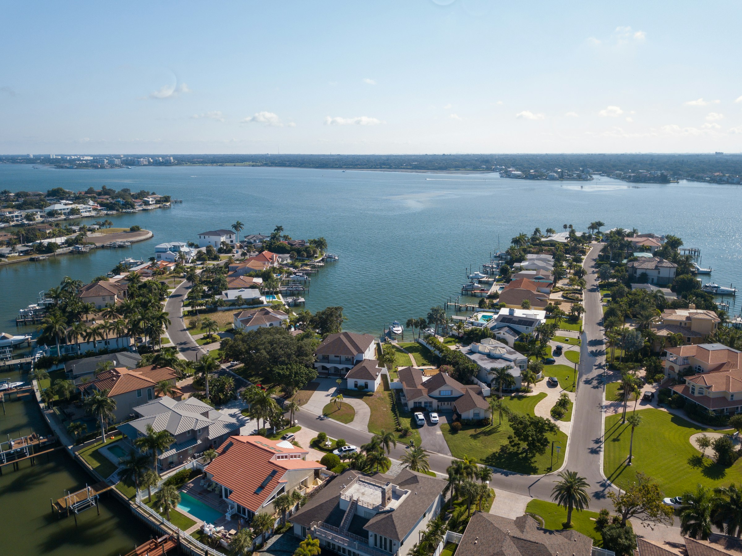 Florida waterfront estate with architectural clay tile roof